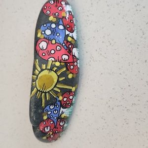 Mushroom painted rock with sun